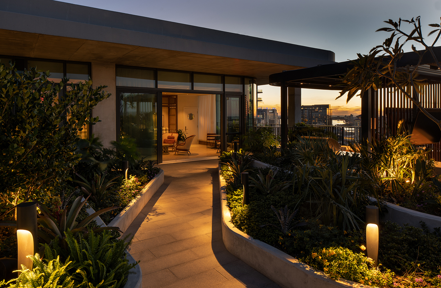 Cora's rooftop amenity space at sunset