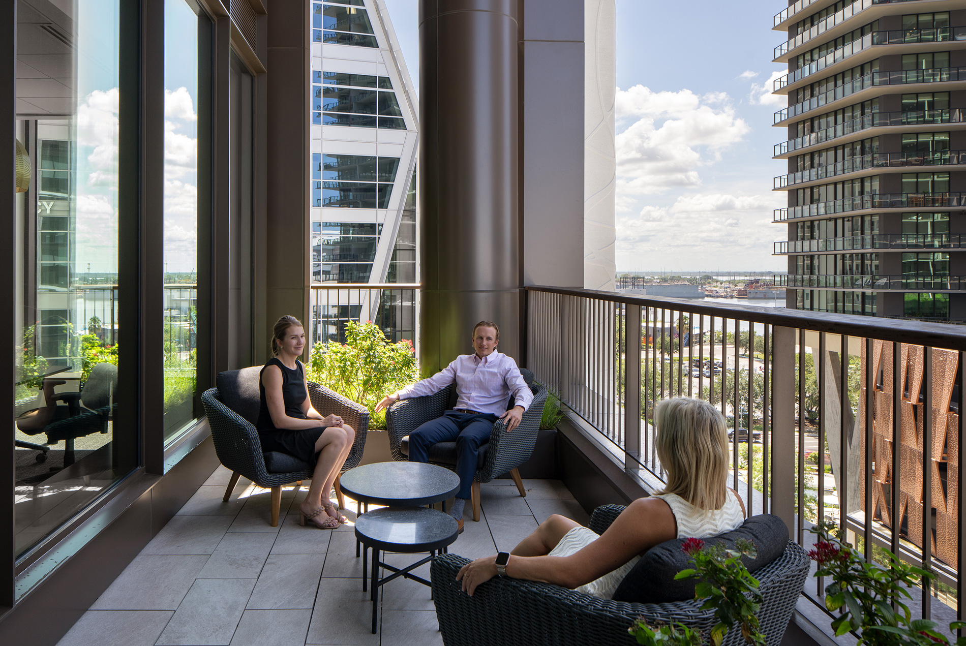 Office tenants enjoy the outdoor terrace at Thousand & One Office building