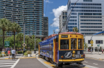 a streetcar in the water street tampa neighborhood