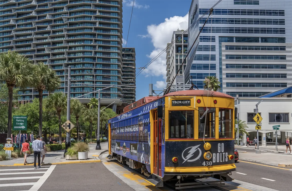a streetcar in the water street tampa neighborhood